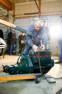 Theon attaching engine to hoist.