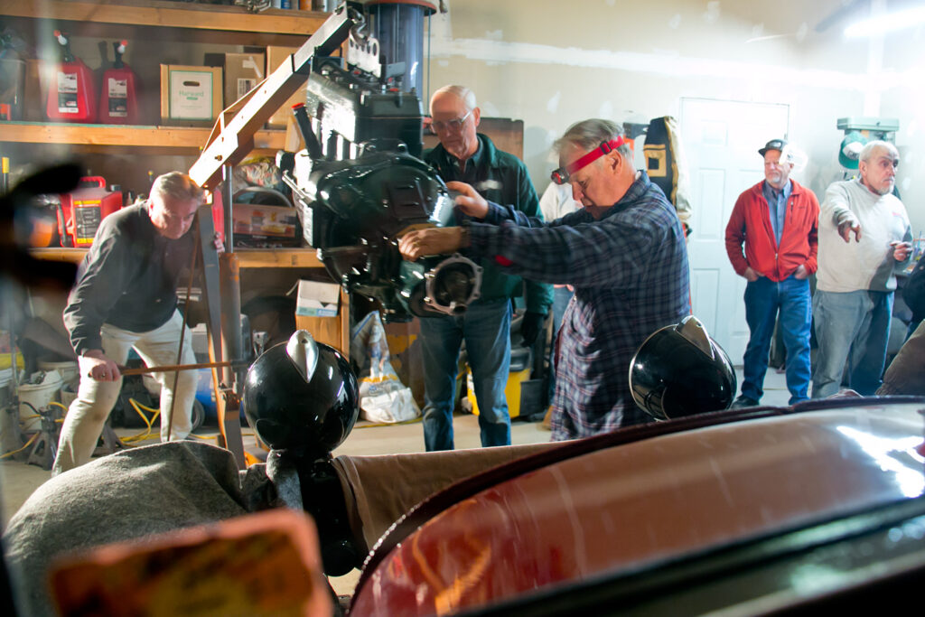 Guiding engine into place.